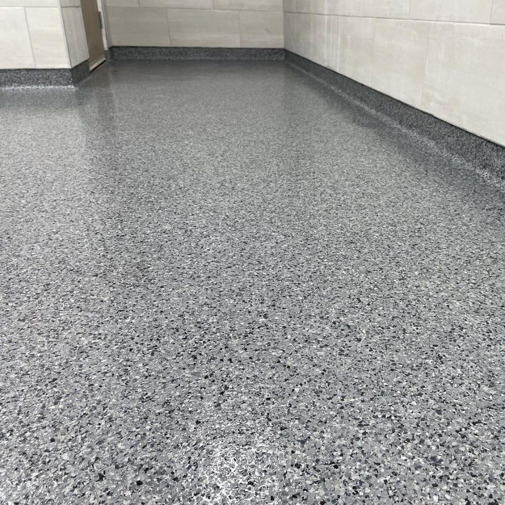 Close-up of dark gray flake epoxy pattern