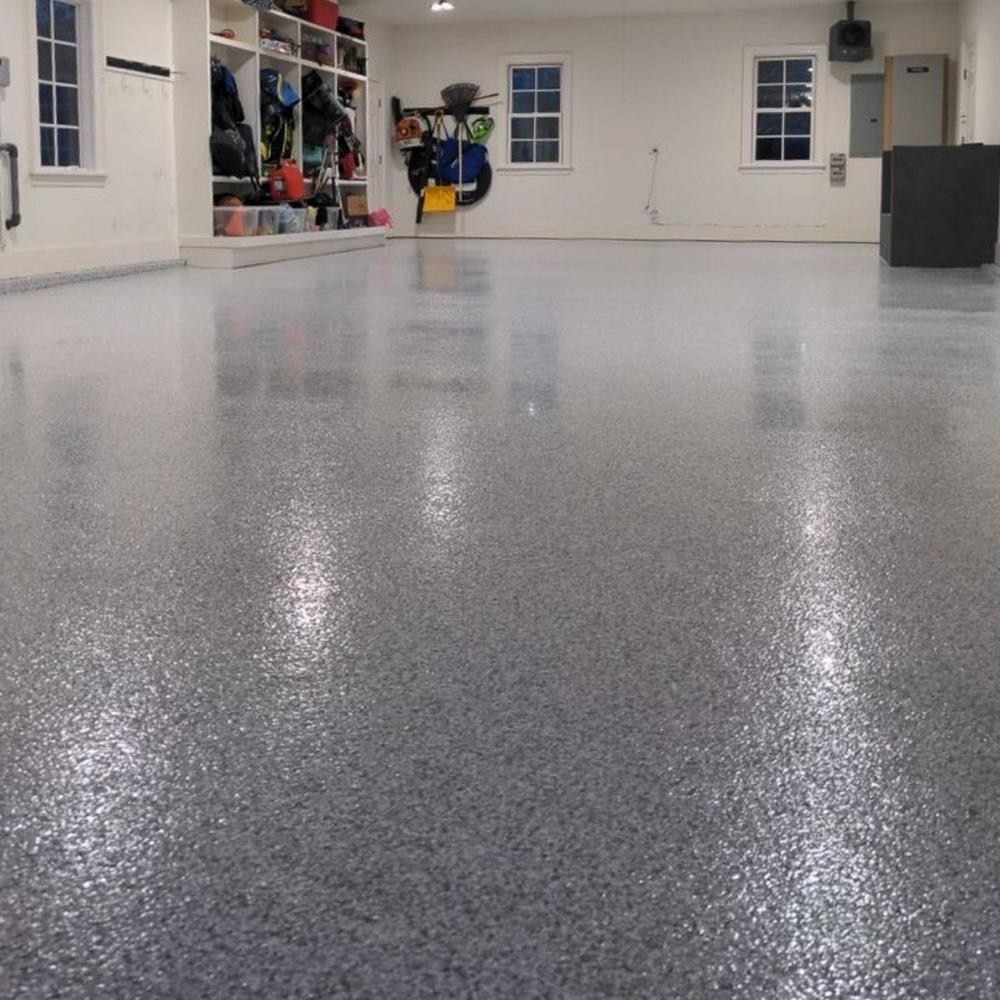 Finished garage with storage and glossy epoxy floor